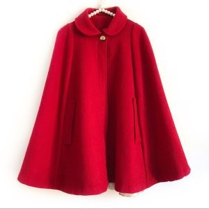 red poncho coat